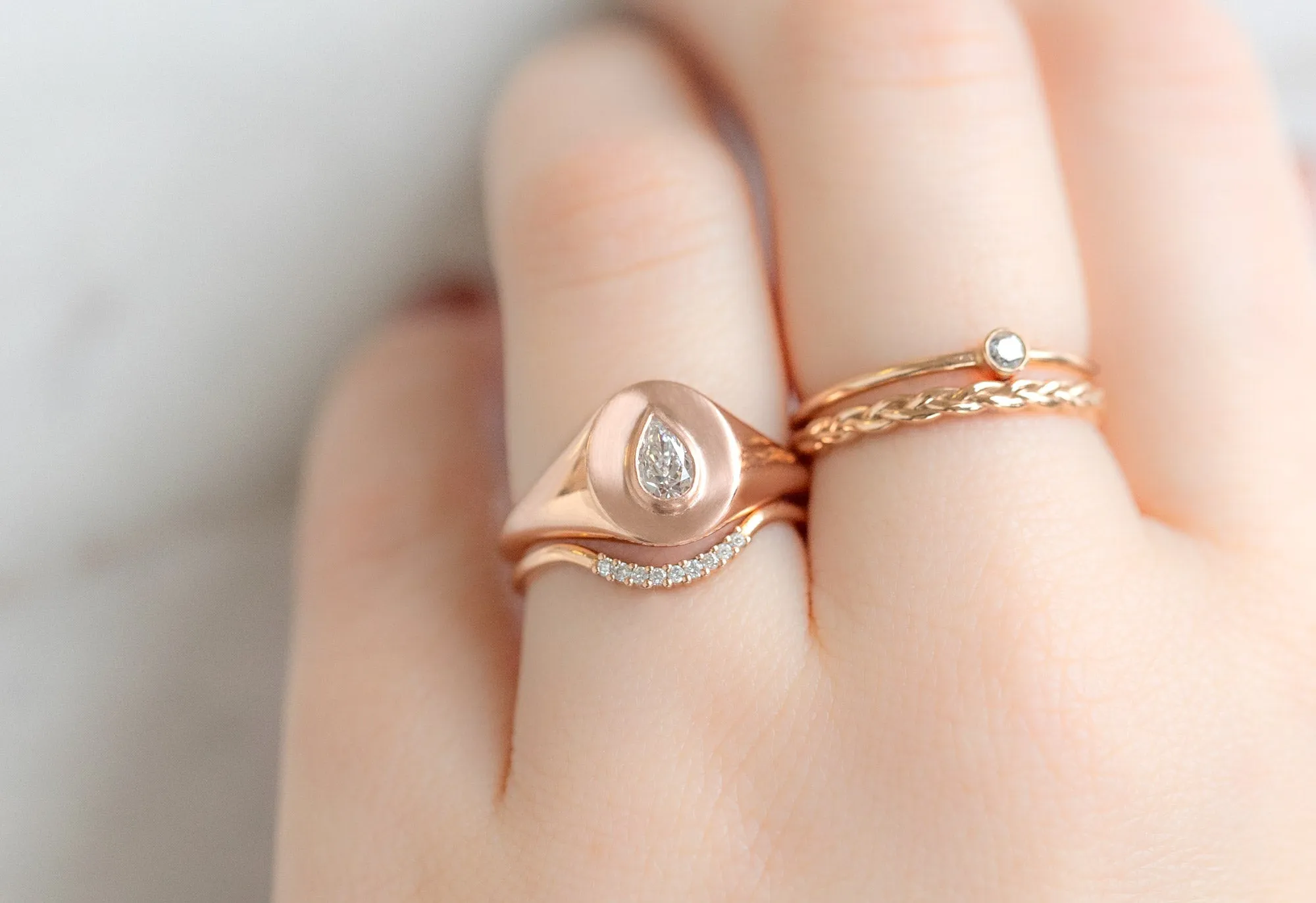 The Signet Ring with a .32ct Pear-Cut White Diamond