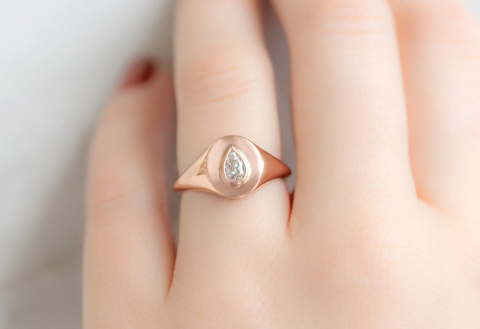 The Signet Ring with a .32ct Pear-Cut White Diamond