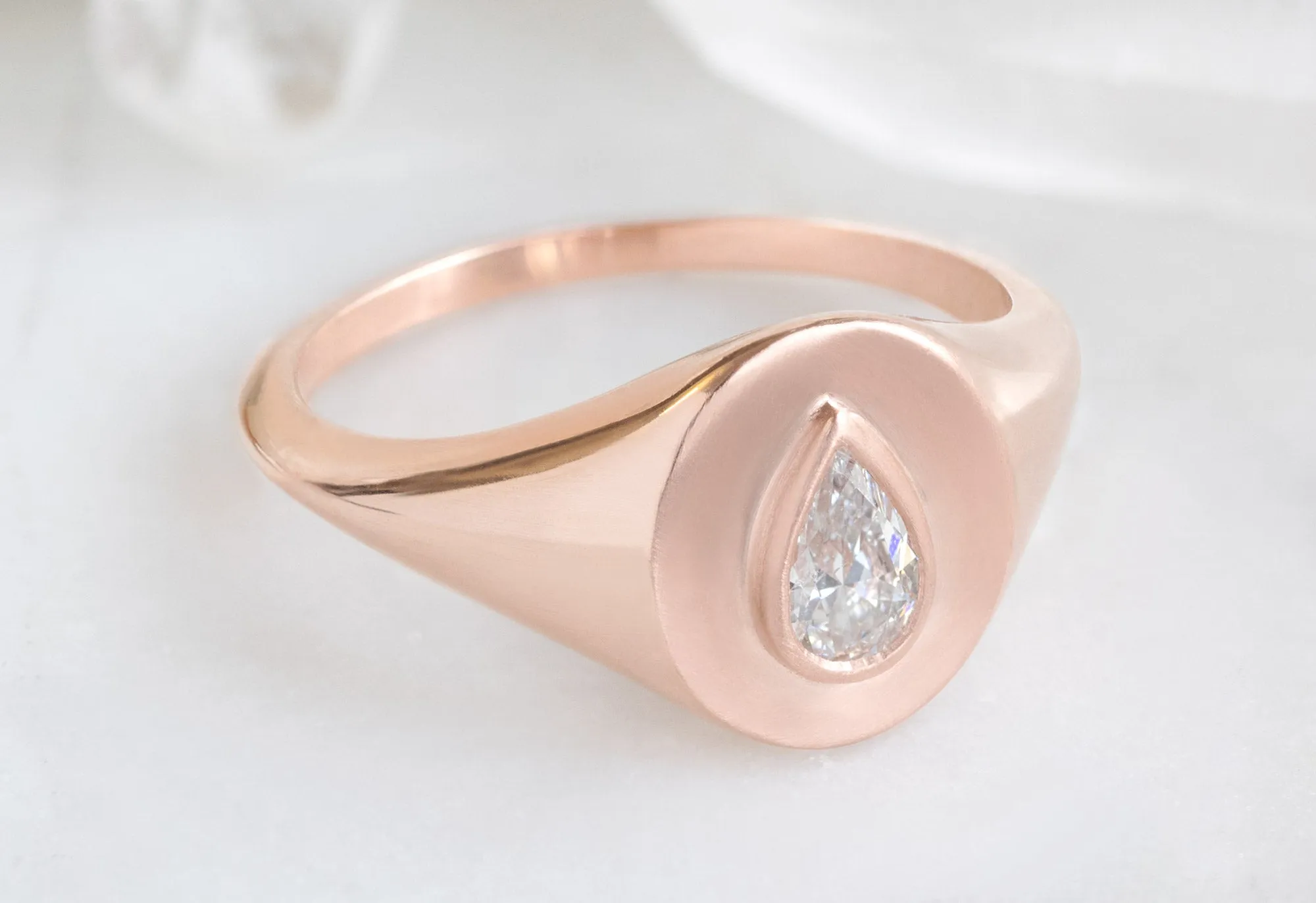 The Signet Ring with a .32ct Pear-Cut White Diamond