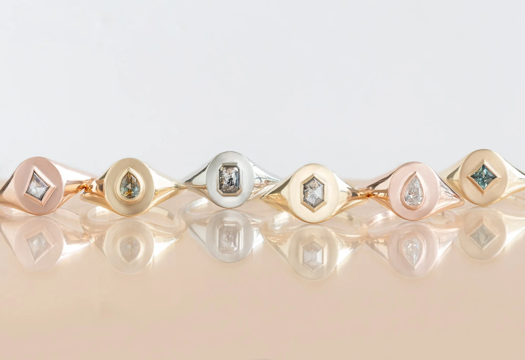 The Signet Ring with a .32ct Pear-Cut White Diamond